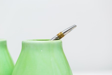 Yerba mate. South american tea in green container.の写真素材