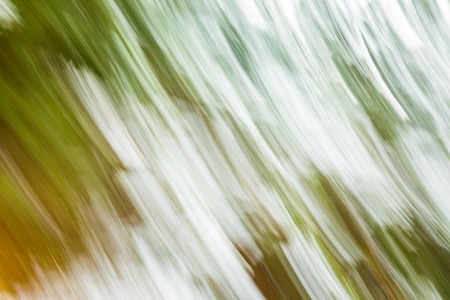 Blurry motion abstract background in green tones.の写真素材
