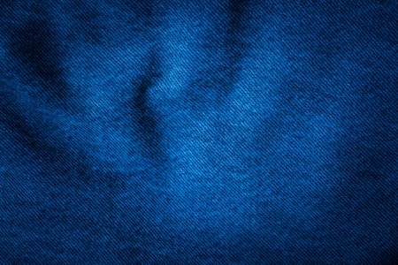 Close up of jeans texture. Background of piece of jeans trousers in close up.の写真素材