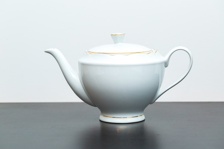 Elegant porcelain white jug in close up. Piece of porcelain service.の写真素材
