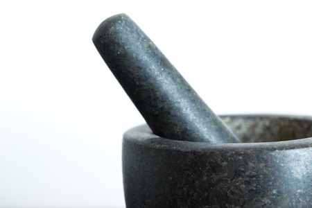 Granite mortar standing on kitchen table. Kitchen tool in close up.の写真素材