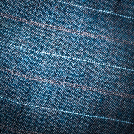 Checkered material background. Close up of kitchen tablecloth with checks.
