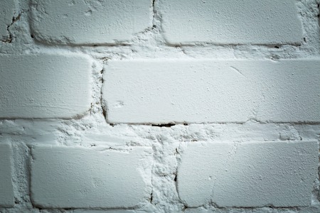 Brickwall painted. Close up of old brick wall with color.の写真素材