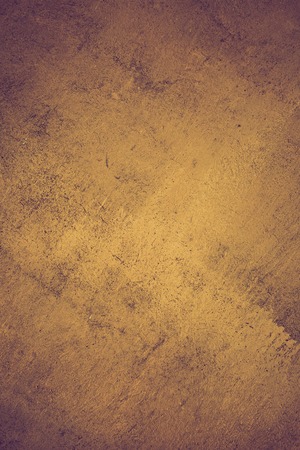 Vintage old grungy background with strong texture - useful as backdrop.の写真素材