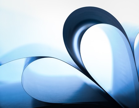 Paper cards abstraction in shallow depth of field. Close up of book cards with curves.の写真素材