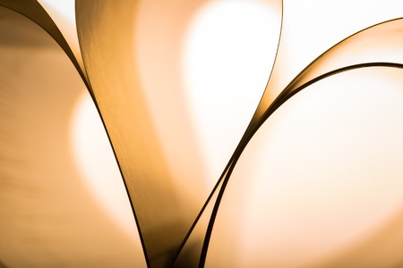 Paper cards abstraction in shallow depth of field. Close up of book cards with curves.