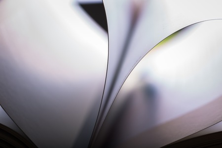 Paper cards abstraction in shallow depth of field. Close up of book cards with curves.の写真素材