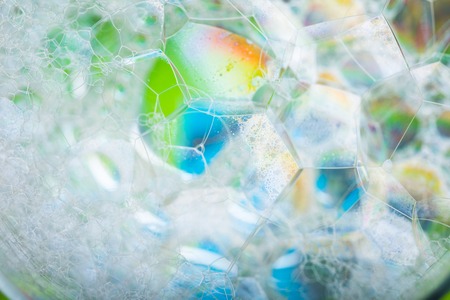 Air foam bubbles in close up. Soap foam macro abstract.