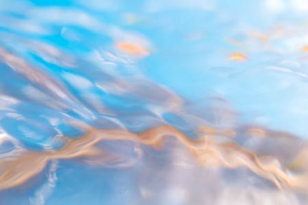 Abstract macro of moving waves on luquid. Water surface macro.