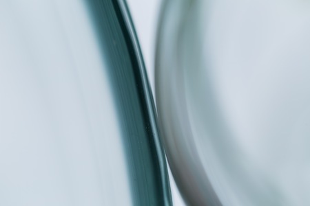 Glass blurry abstraction. Thick or thin glass in big close up - artistic abstract background.