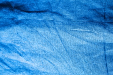 Burlap background in close up. Texture of color canvas useful as background.の写真素材