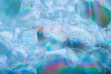 Foam in close up. Abstract background of air bubbles.