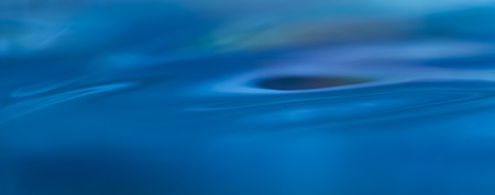 Abstract macro of water surface. Colorful macro abstraction of liquid surface.の写真素材