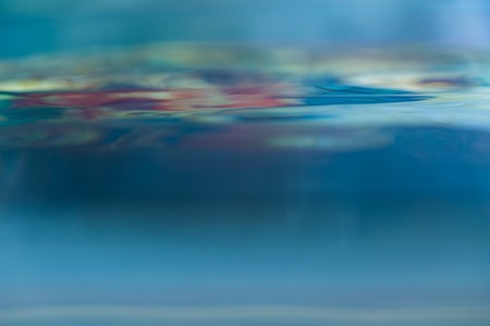 Abstract macro of water surface. Colorful macro abstraction of liquid surface.の写真素材