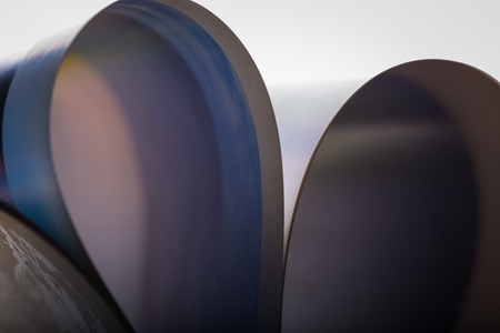 Paper cards abstraction in shallow depth of field. Close up of book cards with curves.の写真素材