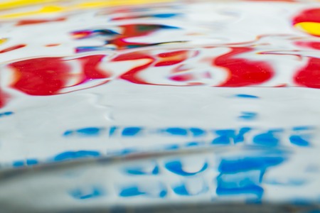 Abstract macro of water surface. Colorful macro abstraction of liquid surface.