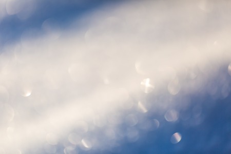 Blurred winter background. Natural abstract snow with shallow depth of fieldの写真素材
