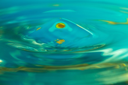 Abstract macro of moving waves on luquid. Water surface macro.の写真素材