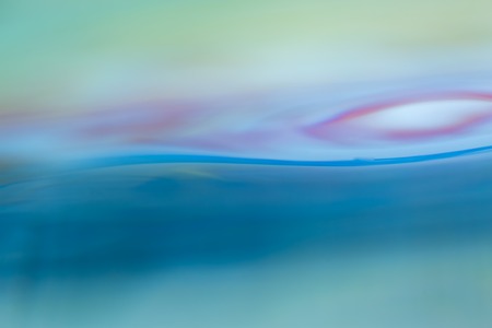 Abstract macro of water surface. Colorful macro abstraction of liquid surface.