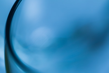 Glass blurry abstraction. Thick or thin glass in big close up - artistic abstract background.の写真素材