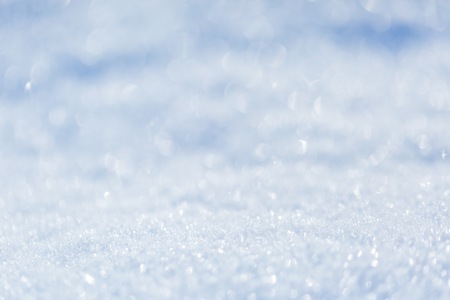 Blurred winter background. Natural abstract snow with shallow depth of fieldの写真素材