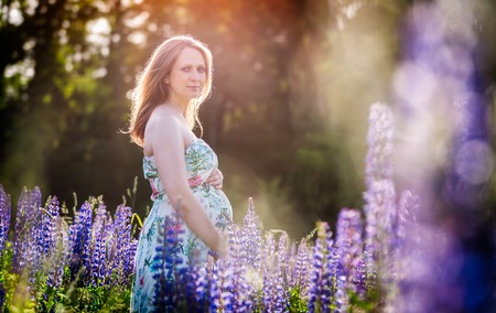 Pregnant woman outdoor portrait. Beautiful caucasian pregnant woman.の写真素材