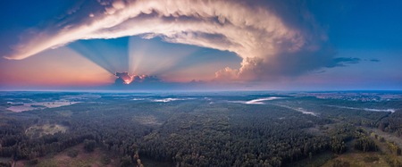 Beautiful misty evening panoramic landscape photographed from drone. Magical atmosphere.