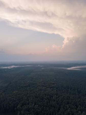 Beautiful misty evening landscape photographed from drone. Magical atmosphere.の写真素材