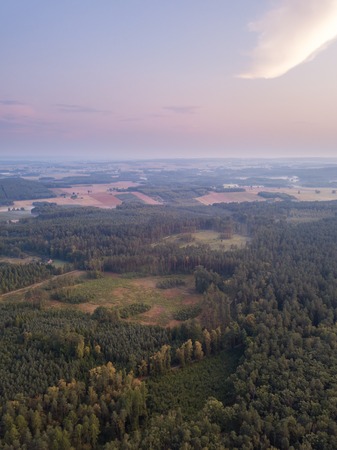 Beautiful misty evening landscape photographed from drone. Magical atmosphere.の写真素材