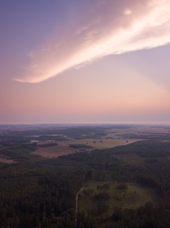 Beautiful misty evening landscape photographed from drone. Magical atmosphere.の写真素材