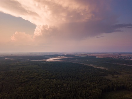 Beautiful misty evening landscape photographed from drone. Magical atmosphere.の写真素材