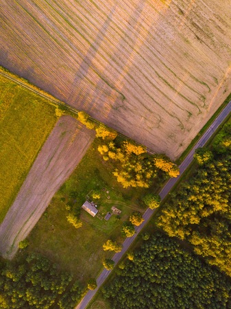 Top down view of farmland. Polish golden light landscapeの写真素材