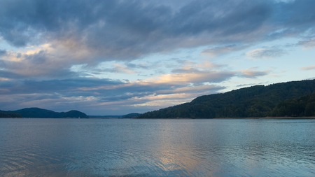 Beautiful Solinskie lake in Bieszczady mountains. Beautiful mountain lake under blue sky with clouds.の写真素材