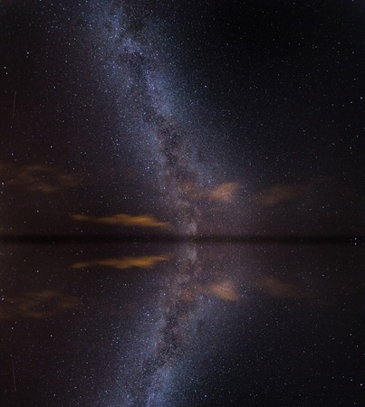 Surreal sea at night landscape with starry sky. Dreamy look.の写真素材