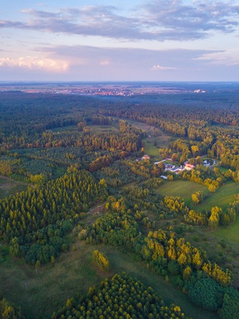Aerial: FIelds in sunset light. Drone viewの写真素材
