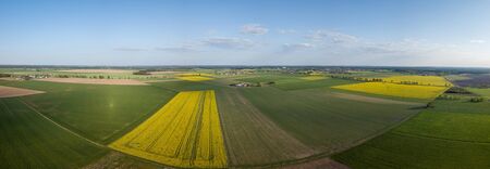 Beautiful green spring fields from above. Drone landscapeの写真素材