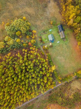 Top down drone landscape with buildings on fields. Farm from above.の写真素材