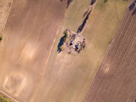 Early spring aerial abstract field landscape. Top down aerial.の写真素材