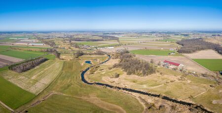 Early spring aerial landscape with fields of Poland. Typical polish landscape photographed from above.の写真素材