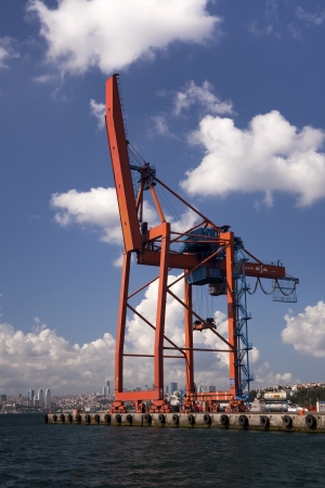 Istanbul, Uskudar, Turkey - July 31, 2012 - Haydarpasa Commercial Dock and Container Crane at Istanbul,Turkey. You are watching white clouds and sunny sky at the background and a little part of Istanbul.のeditorial素材