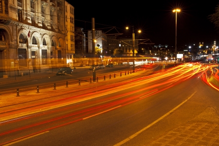 Istanbul, Karakoy, Turkey - May 29, 2012  Cars lights are visible at the long exposure image and some historical buildings at Istanbul,Karaköy District,Turkey  Also some cars are waiting near the buildings のeditorial素材