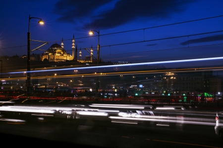 Suleymaniye Mosque at Istanbul in night time. Cars passing by の写真素材