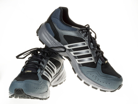 Istanbul, Turkey - January 29, 2014  New Adidas outdoor running shoes  Taken at studio and isolated on white のeditorial素材