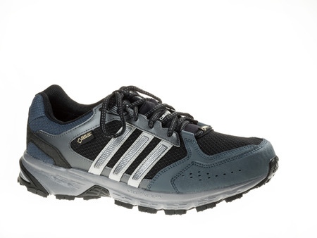 Istanbul, Turkey - January 29, 2014  New Adidas outdoor running shoes  Taken at studio and isolated on white  Side Viewのeditorial素材