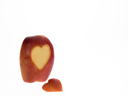 Apple slice with heart symbolの写真素材