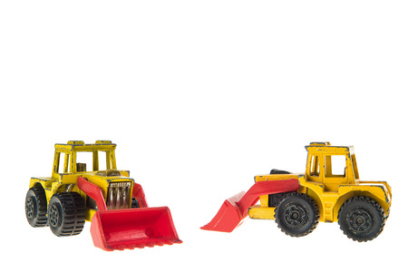 Toy Bulldozers Isolated on White Backgroundの写真素材
