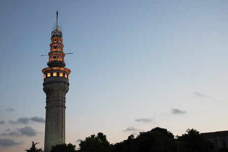 Beyazit fire-watch tower in garden of Istanbul University at Istanbul, Turkey. This building is a...