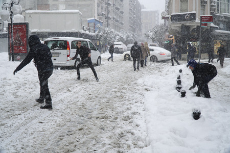 Istanbul, Eminonu, Turkey - January 9, 2017: Istanbul was covered with snow. This blizzard was the strongest of the last 30 years. There were people playing snowball at the streets of The Eminonu.のeditorial素材