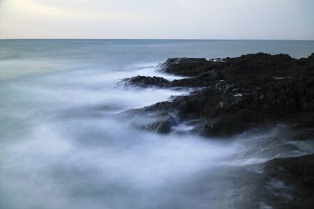 Long exposured rocks at the seacoastの写真素材