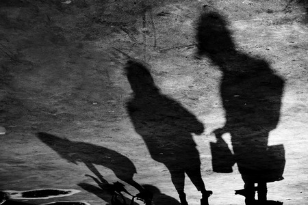 Shadows of A Family with Catの写真素材